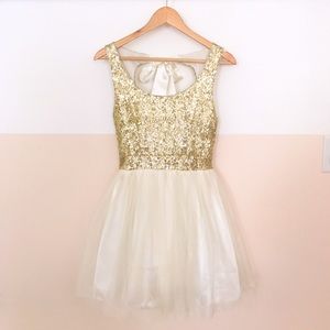 COPY - A mini gold sequin and eggshell dress